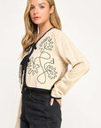 EMBROIDERED TIE FRONT JACKET
