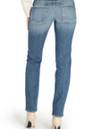 model wearing fidelity denim axl girlfriend fit jean in cortez blue, shown from the rear