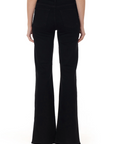 model wearing fidelity denim katie trouser fit in jett black, shown from the rear