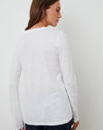 model wearing liz city slub crew neck long sleeve tee in white from Velvet, shown from the back