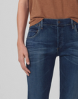 model wearing citizens of humanity emerson slim fit boyfriend jean in blue rose, pocket close up