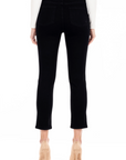 model wearing fidelity denim cher slim jean in noir black, shown from the rear