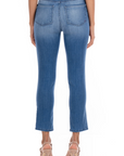 model wearing fidelity denim cher slim jean in st martin blue, shown from the rear