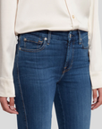 close up view of the waist of the 7 for all mankind kimmie mid rise straight in luxe love story blue, showing front pockets