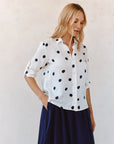 SPRING DOTS CLEAN SPLIT BACK BUTTON DOWN SHIRT