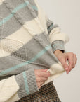 STRIPED CABLE KNIT TURTLENECK SWEATER