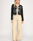 EMBROIDERED TIE FRONT JACKET