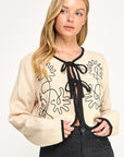 EMBROIDERED TIE FRONT JACKET