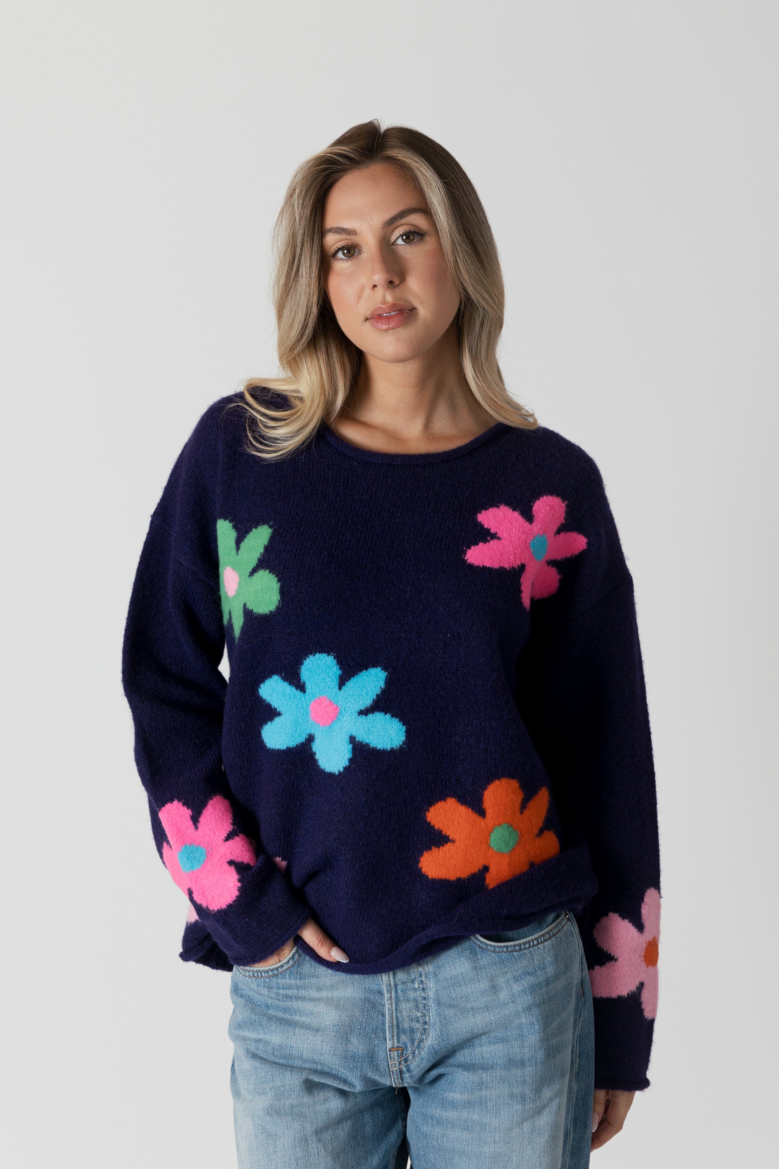 model wearing lyla & luxe jodi multicolour flower print sweater, front view