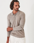 front view of the 14GG MERINO POLO, styled with white pants