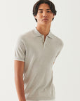 SHORT SLEEVE TIPPED BUTTON POLO SWEATER