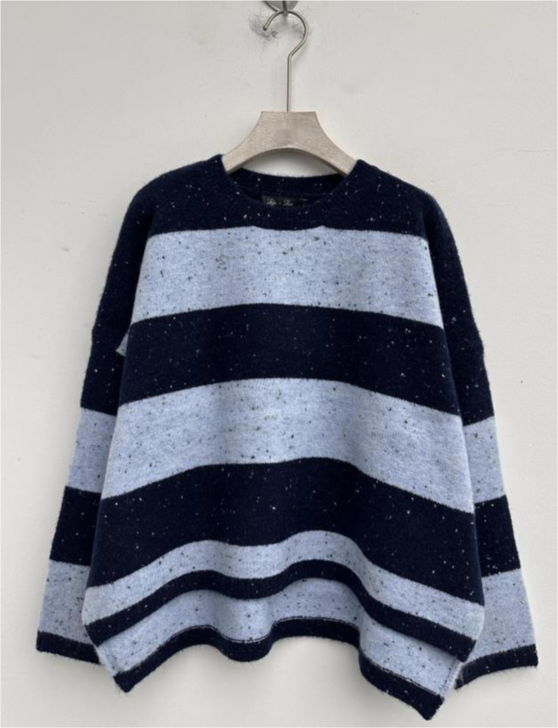 lyla & luxe ravian navy and light blue stripe sweater on a hanger