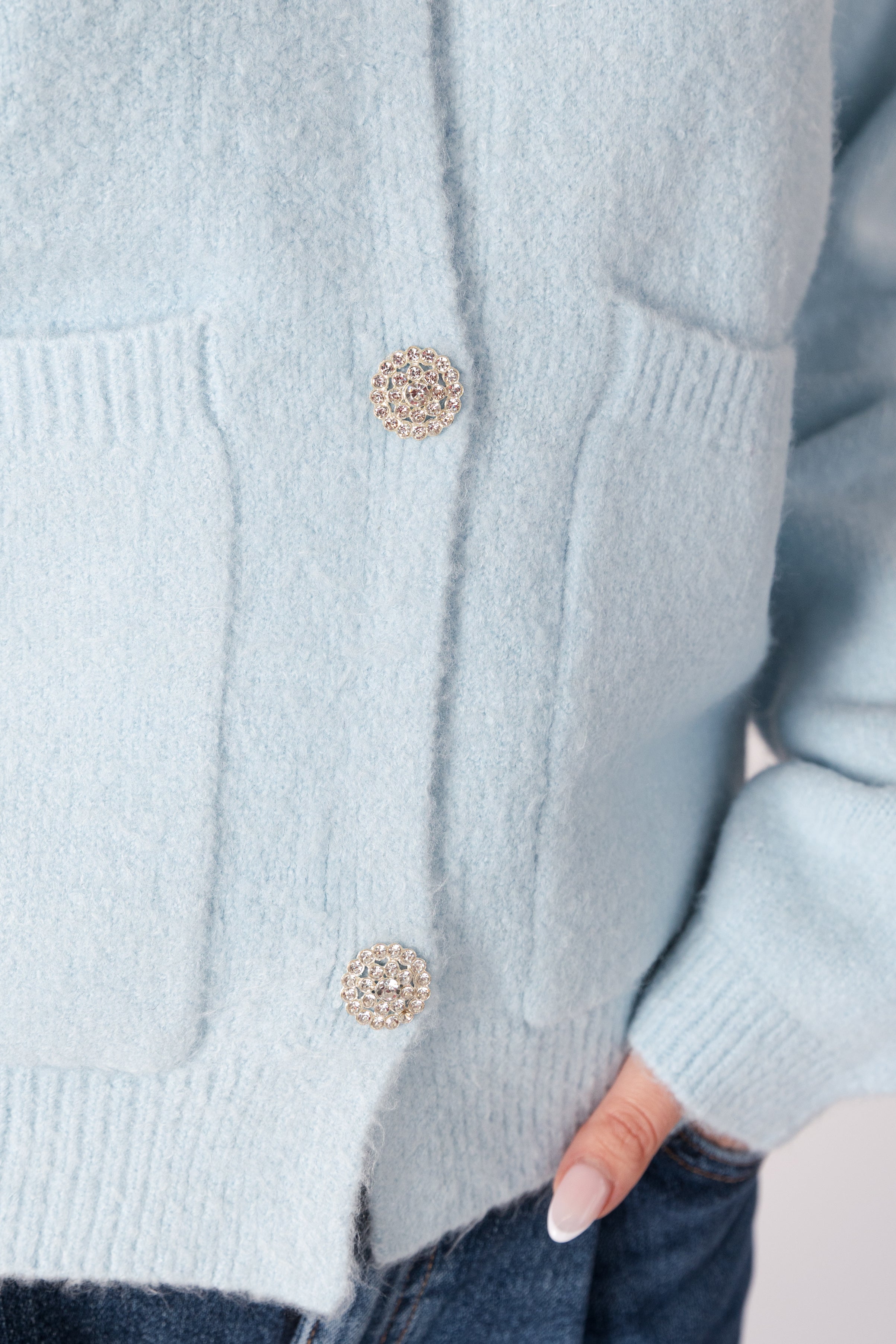 close up of buttons on lyla & luxe stella crystal button cardigan