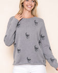SHADOW SKULL ROLL HEM SWEATER