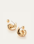 jenny bird nautilus shaped dylan earrings in gold, showing the ball-shaped back of the earring