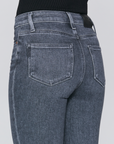 close up rear view of the cindy jean with raw hem from paige in grey, showing rear pocket detail