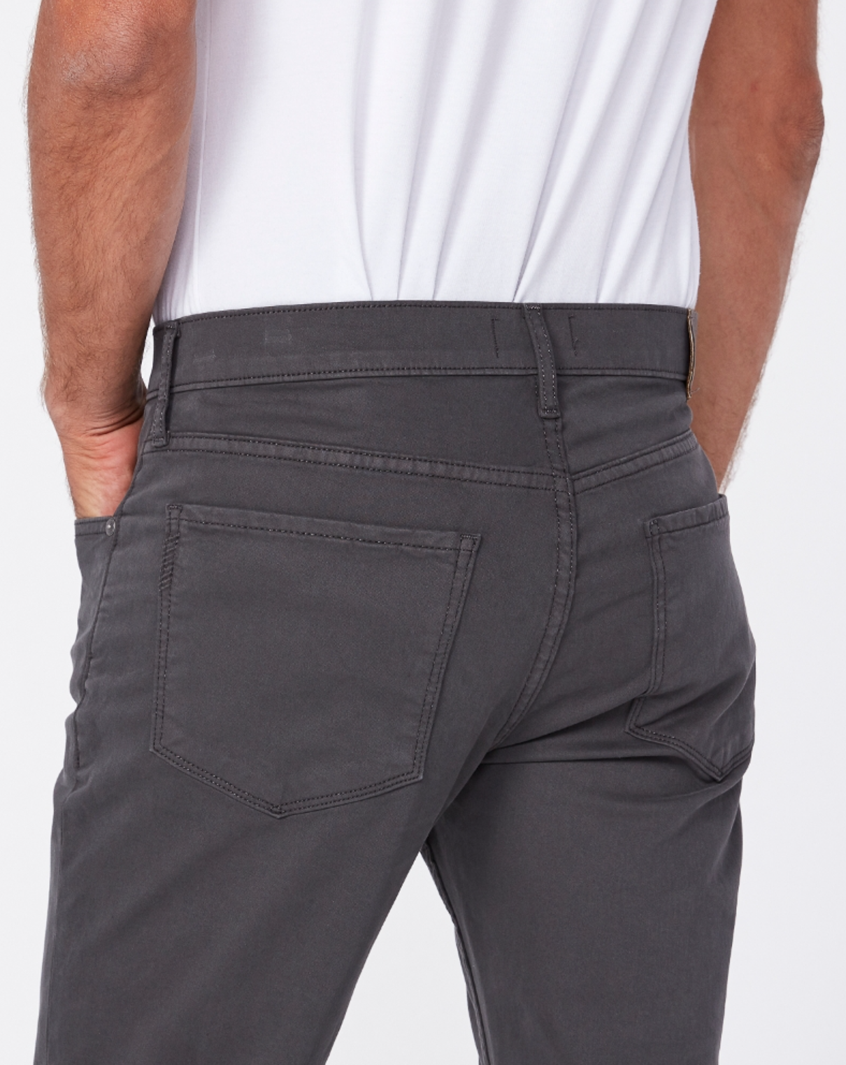 close up rear view of the lennox skinny fit twill pant from paige, showing rear pocket detail